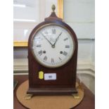 A Regency style mahogany and ebony strung mantel clock, Comitti of London, the domed case with