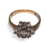 A cubic zirconia ring set in 9 carat gold