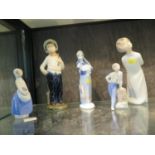 Three Continental porcelain figures of children, various makers, and two other Rex figures