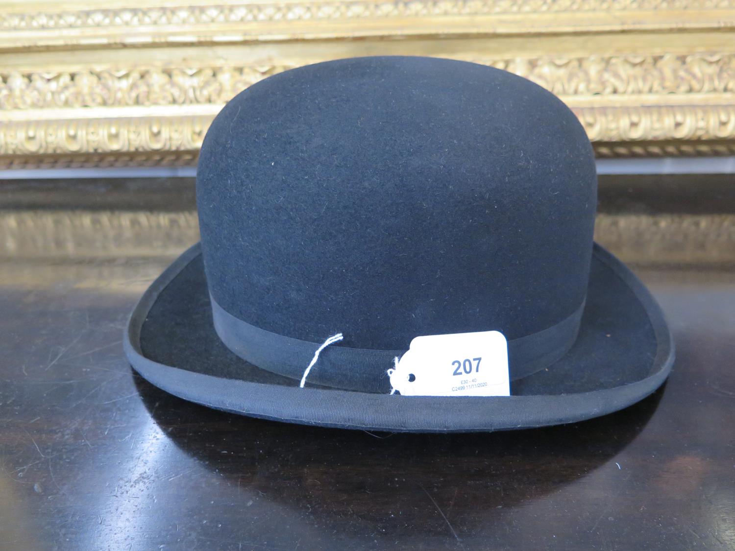 A 'Dulcis' bowler hat, size 7 3/8 'Universe'