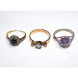 Two gem set rings and a silver ring (3)