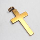 A 15 carat gold cross