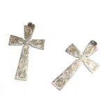 Two decorated silver crosses