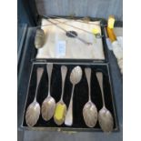 A cased set of silver coffee spoons, a thimble holder and five hat pins