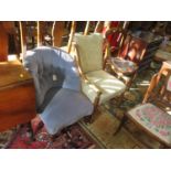 A blue upholstered button back bedroom chair with turned legs and pot castors, a walnut bedroom