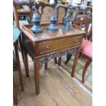 A Colonial hardwood side table, the gallery top over a frieze drawer and foliate fret carved