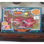 A boxed Bandai Power Rangers Wild Force 'Red Wild Force Rider'