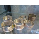 Six various silver napkin rings (6)