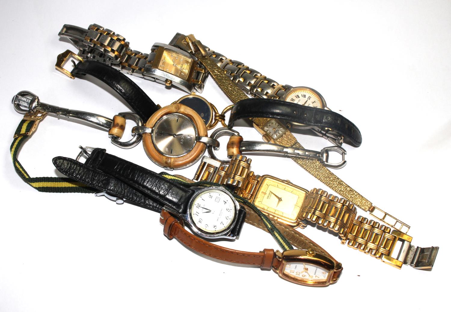 Nine mixed ladies' and gentlemen's fashion watches