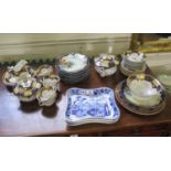 A Victorian yellow, blue and gilt tea service, with teapot and six cups, eleven Bavarian fruit