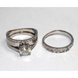 A white gold three row diamond ring, one side of the ring detachable and the other diamond set and