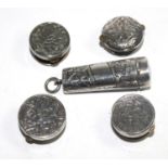 A collection of four silver buttons and a silver cheroot holder