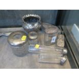 Seven miscellaneous bottles and jars for a lady's dressing table, some with silver lids