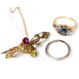 A VICTORIAN PERIDOT, GARNET AND SEED PEARL BAR BACKED BROOCH, a platinum band and a sapphire and