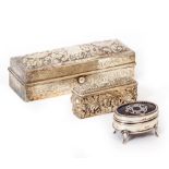 A VICTORIAN SILVER BOX with repousse decoration, having marks for London 1893, 17cm wide x 6cm