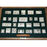 A CASED SET OF SOLID SILVER REPLICAS OF THE STAMPS OF ROYALTY