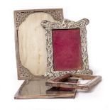 FOUR SILVER PHOTO FRAMES to include an arts and crafts Birmingham example 19cm (4)