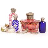 A COLLECTION OF SCENT BOTTLES including one in the form of a shell and a horn plus a sterling silver