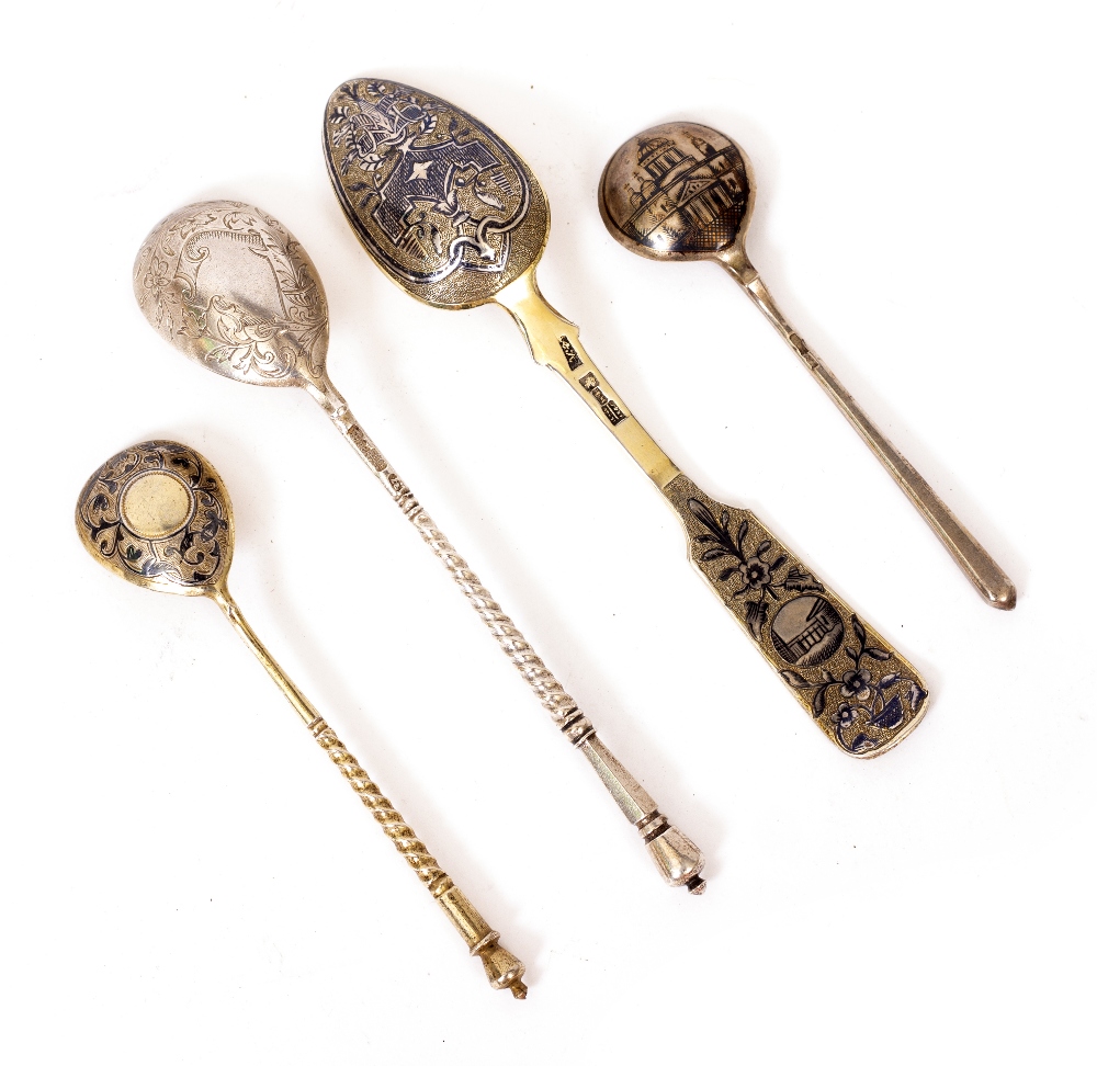 THREE RUSSIAN WHITE METAL TEASPOONS with Niello work decoration and a further Russian white metal