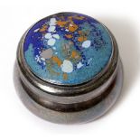 BERNARD INSTONE (1891-1987) A circular silver small box with a marble effect enamelled top, with