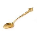 A TIFFANY & CO 18 CARAT GOLD TEASPOON 10cm long and approximately 8 grams