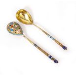 A RUSSIAN SILVER GILT AND CLOISONNE ENAMELLED TEASPOON by Peter Farisiev, circa.1900, 13.5cm long