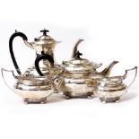 A MATCHED SILVER FOUR PIECE TEA AND COFFEE SET the teapot, sugar basin and milk jug with marks for