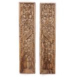 TWO 17TH CENTURY GOTHIC CARVED WALNUT PANELS with quatrefoil and flowerhead decoration, each with