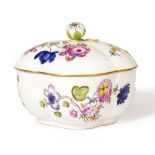 AN 18TH CENTURY MEISSEN PORCELAIN SAUCE TUREEN AND COVER of lobed form decorated with flowers and