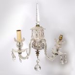 A PAIR OF CUT GLASS TWO BRANCH WALL LIGHTS in the Georgian manner, 30cm wide x 41cm high