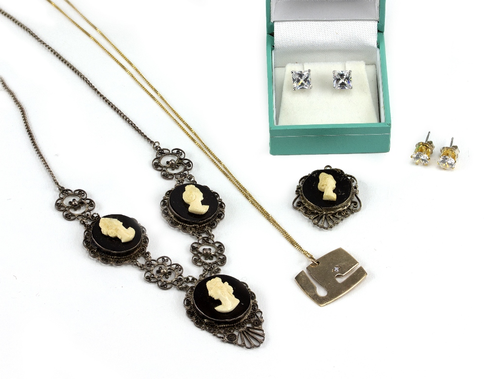 A 9 CARAT GOLD DIAMOND SET PENDANT AND CHAIN, a cameo necklace and two pairs of crystal earrings