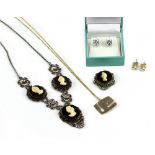 A 9 CARAT GOLD DIAMOND SET PENDANT AND CHAIN, a cameo necklace and two pairs of crystal earrings