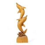 A CARVED WOODEN SCULPTURE DEPICTING TWO LEAPING DOLPHINS 98cm high