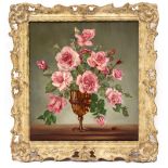 STILL LIFE OF PINK ROSES IN A GLASS oil on canvas, signed Liscard, mounted in a painted scrolling