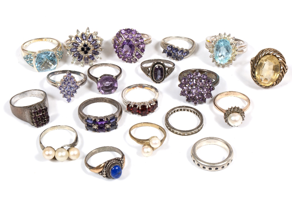 NINETEEN RINGS to include a 9 carat gold citrene set dress ring