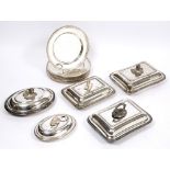 A SET OF TWELVE SILVER PLATED DINNER PLATES 27.5cm diameter and five silver plated entree dishes