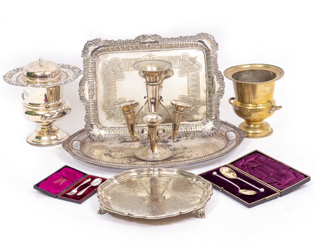 A GROUP OF SILVER PLATE consisting of an oval tray, salver and a further tray, wine coolers, table