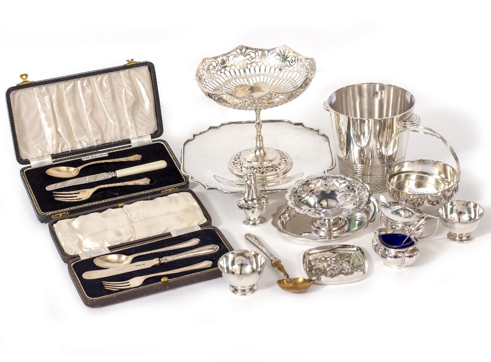 A MIXED LOT OF SILVER AND SILVER PLATE to include pierced silver bonbon dish, a silver tazza, two