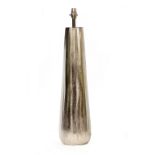 A SILVERED TABLE LAMP with faceted side and tall conical shade, the lamp 16cm diameter, the lamp and