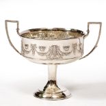A SILVER TWIN HANDLED CUP with marks for Birmingham 1906, 17cm wide x 14cm high