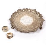 A GEORGE II SILVER SALVER with marks for London 1749, 31.5cm diameter and two silver napkin rings (