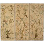 THREE 19TH CENTURY CREWEL WORK PANELS depicting the tree of life, exotic flora and fauna to