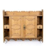 A LATE 19TH / EARLY 20TH CENTURY PINE WALL CUPBOARD with two doors and compartments, 73cm wide x