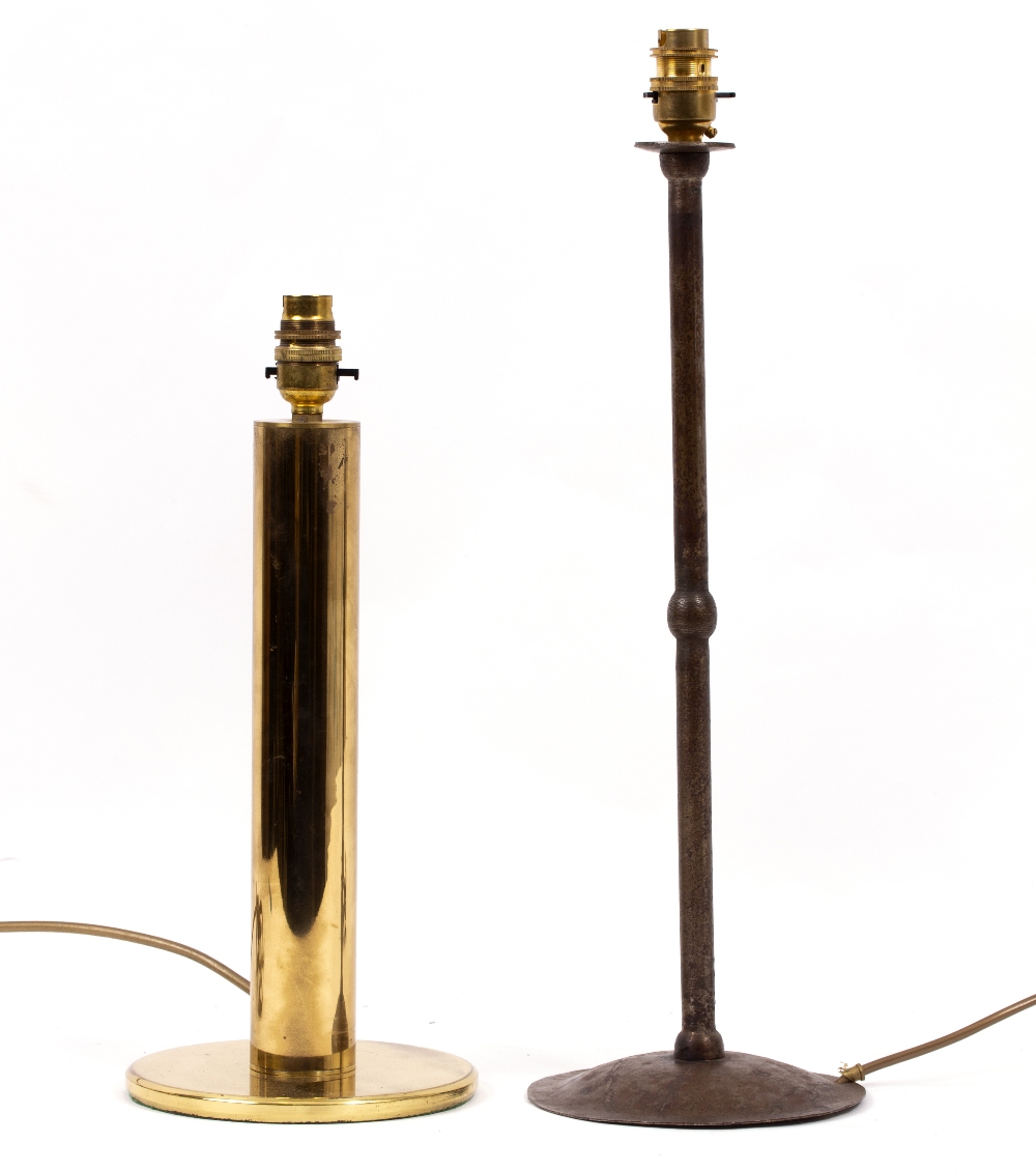 A WROUGHT IRON TABLE LAMP with narrow knoped stem and spreading circular base, 51cm high together