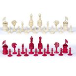 A 19TH CENTURY ORIENTAL TURNED AND CARVED IVORY CHESS SET the kings 10cm high (one pawn with