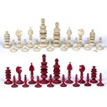 A 19TH CENTURY INDIAN TURNED AND CARVED IVORY CHESS SET the kings 11.5cm high