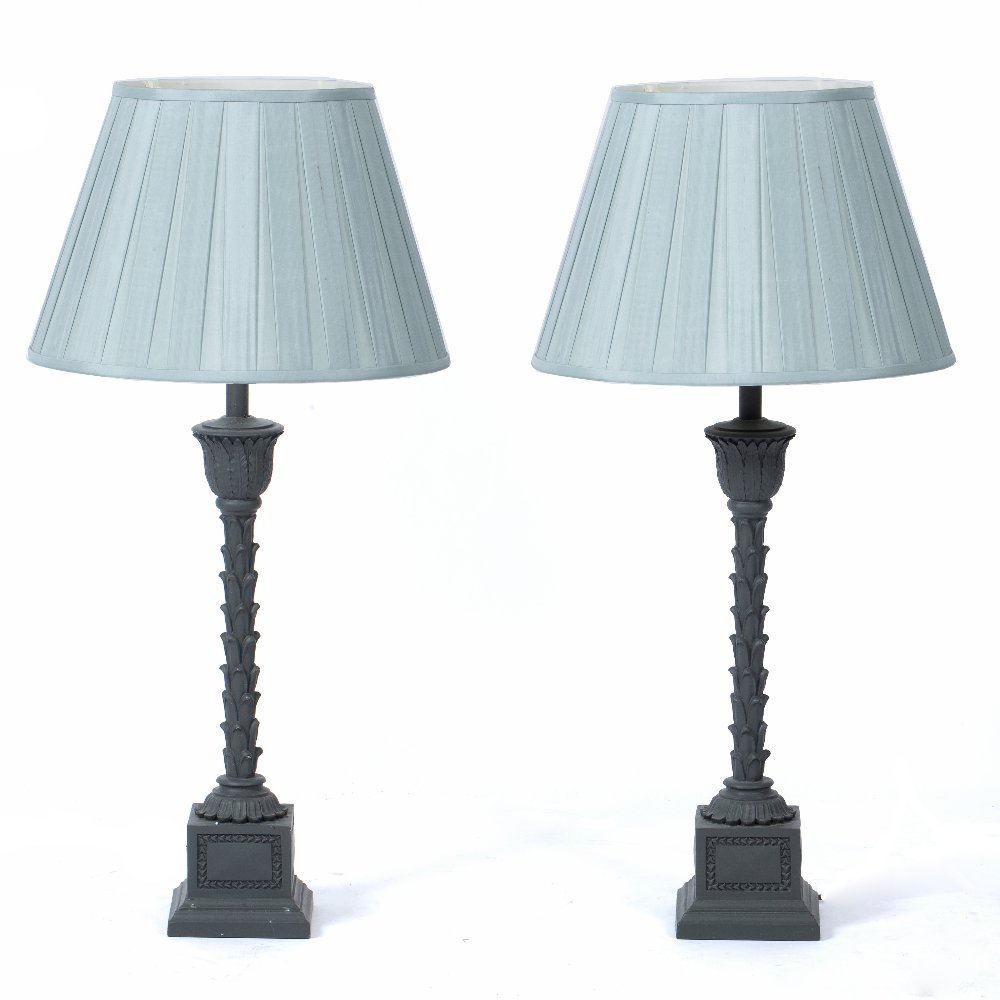 A PAIR OF GREY PAINTED TABLE LAMPS with central supports in the form of palm tree trunks and on