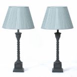 A PAIR OF GREY PAINTED TABLE LAMPS with central supports in the form of palm tree trunks and on