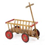 A PAINTED CHILD'S WAGON with red wheels and t-bar pull handle, 74cm long x 42cm high