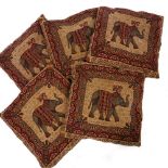 FIVE LARGE DECORATIVE INDIAN STYLE CUSHIONS decorated with elephants and geometric patterns, each